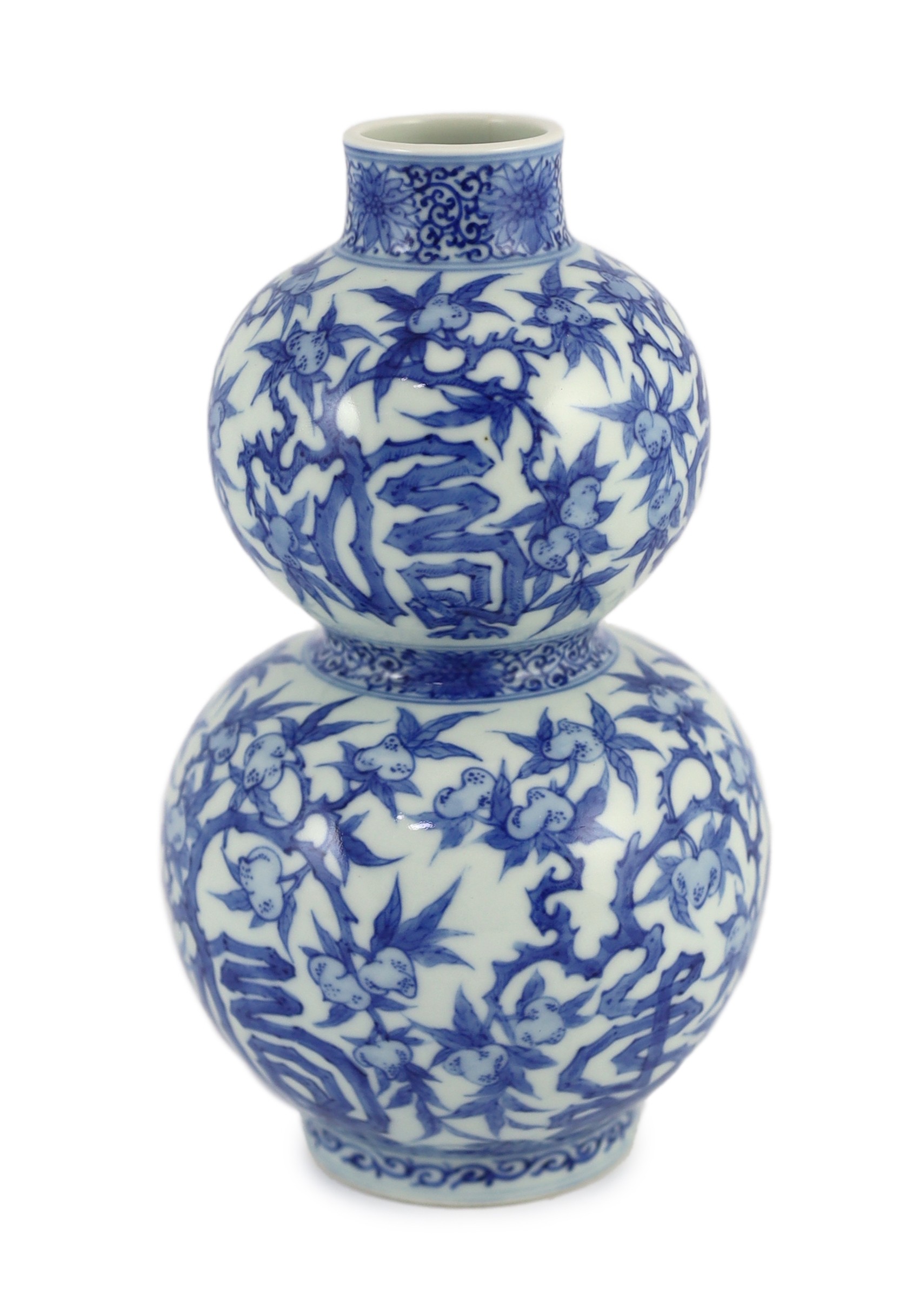 A Chinese blue and white 'fu lu shou' double gourd vase, Wanli mark probably late 19th century, 22cm high, splinter chip to rim and hairline crack to neck